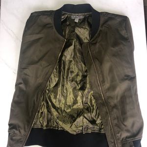 Army green bomber jacket with gold zippers